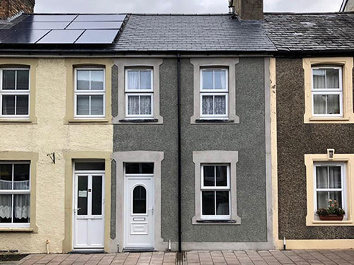 Photo of Pebble Dash finish applied to house exterior by Dyfi Renovations Ltd