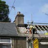 Work on replacing roof on terrace house